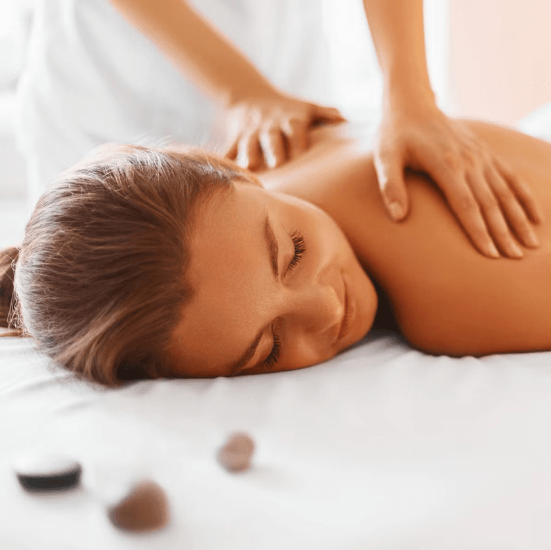 Hot stones arranged for massage therapy
